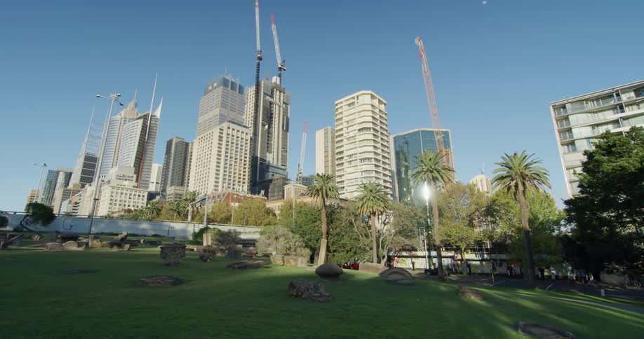 The park is empty in front of the city