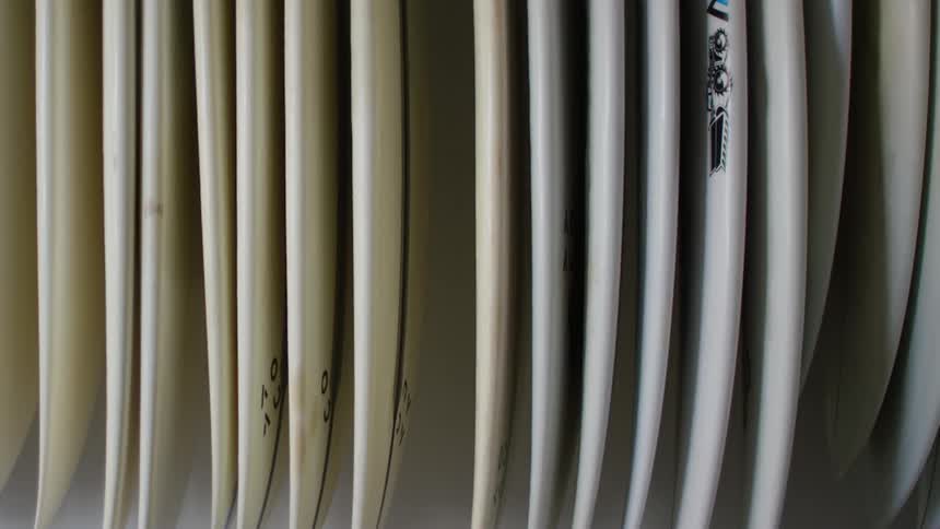 Rows of paper envelopes lined up in a rack