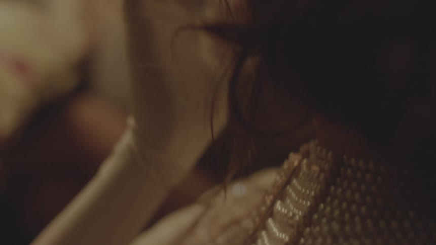 Woman dressed up in pearls