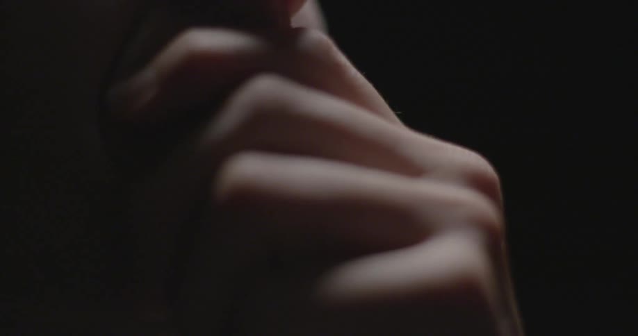 Man rubbing chin