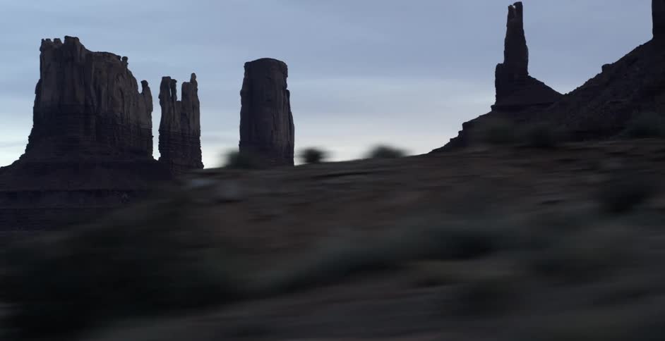 The rock spires sit in the distance