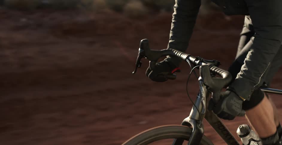 A man is riding a bike outdoors