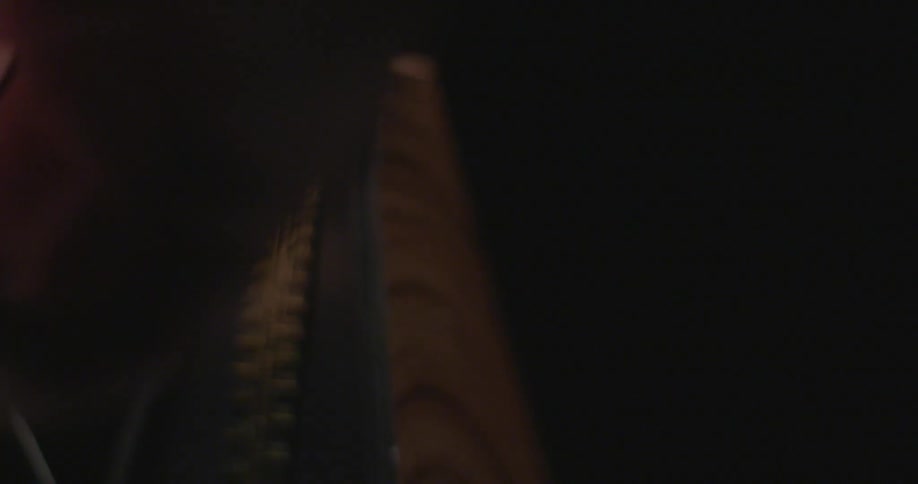 A hand starts a metronome