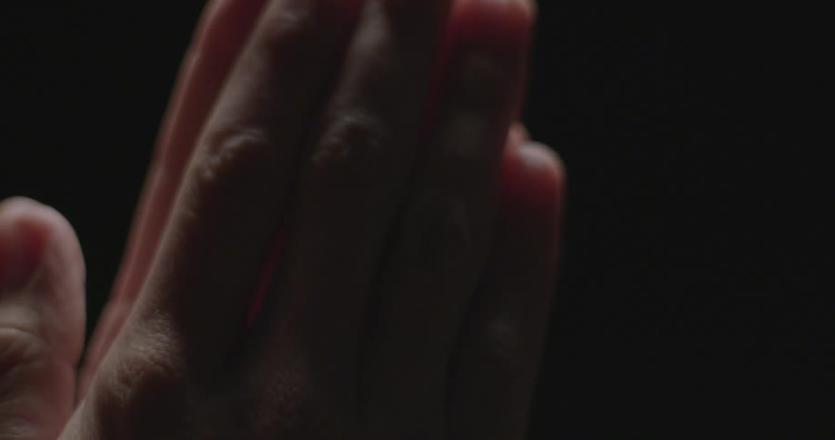 Hands pressed together palm to palm