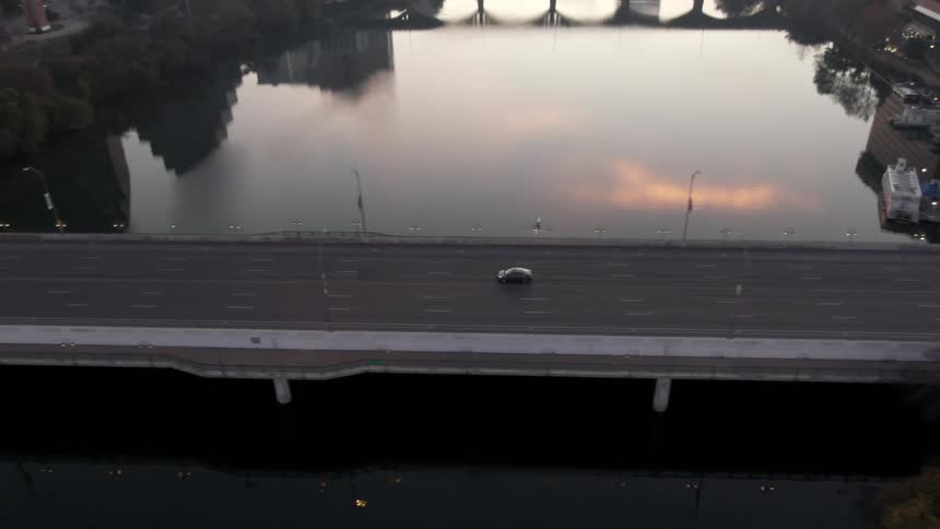 Cars driving across a bridge