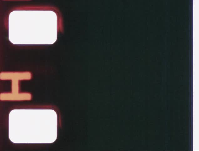 Old film with letters flashing and signs of age