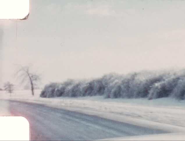Vehicle drives along the icy road