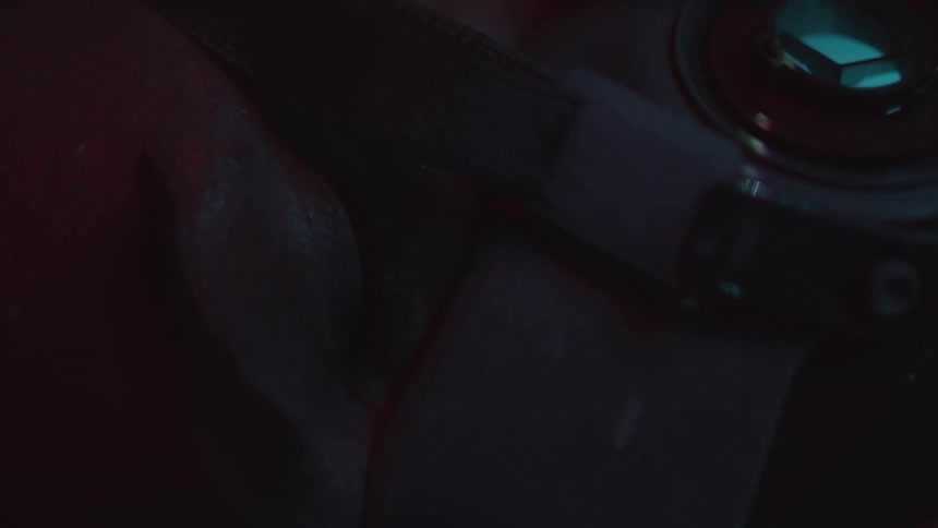 A white person wearing a mask keeps his eye closed