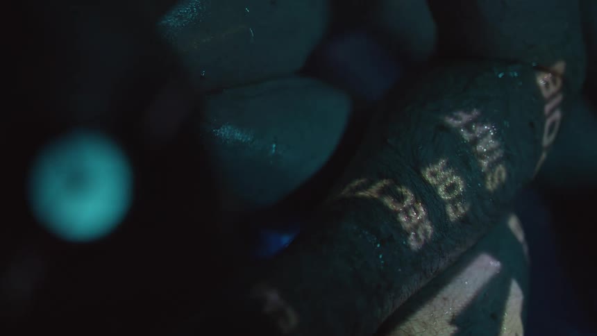 A blanket with writing outside at night