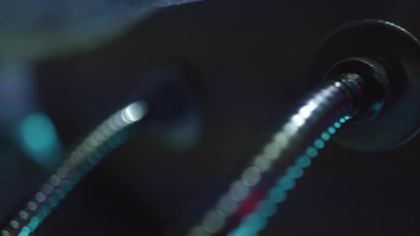 Metal tubes and cables connected with futuristic lights