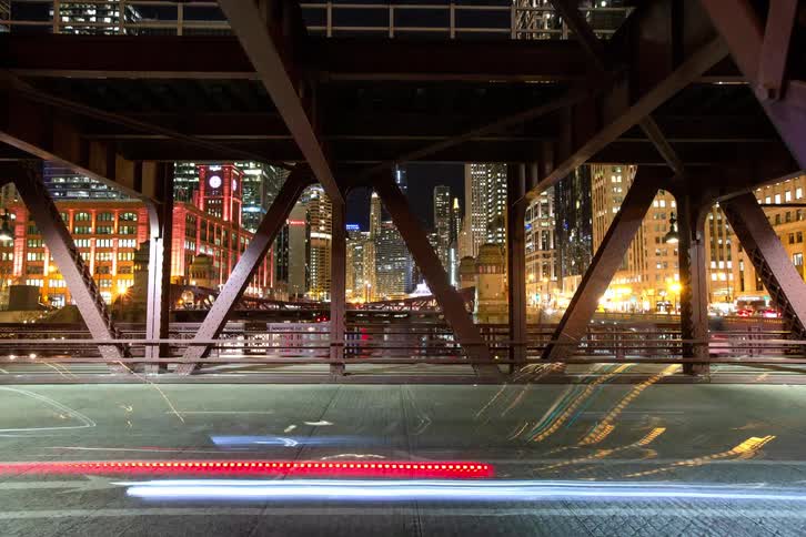 Traffic flows on roads through a downtown area of the city