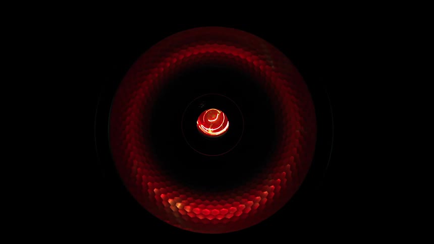A light shines on a red ring