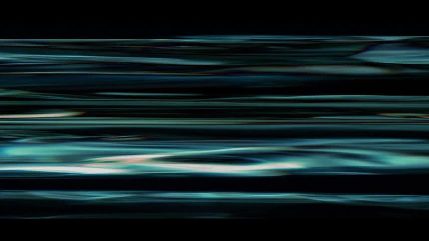A video image flickers and is broken up on a screen