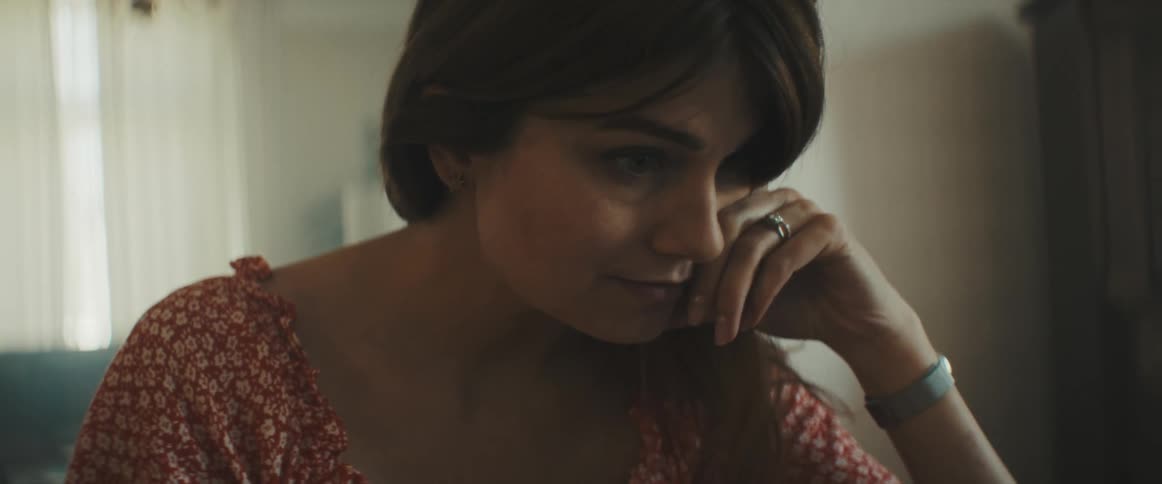 The woman works on the computer