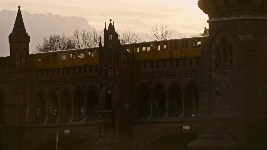 A train drives across a bridge in the city