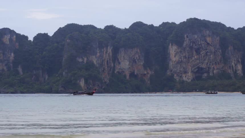 Boats are driving in the ocean