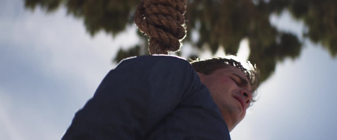 The noose is on the mans neck