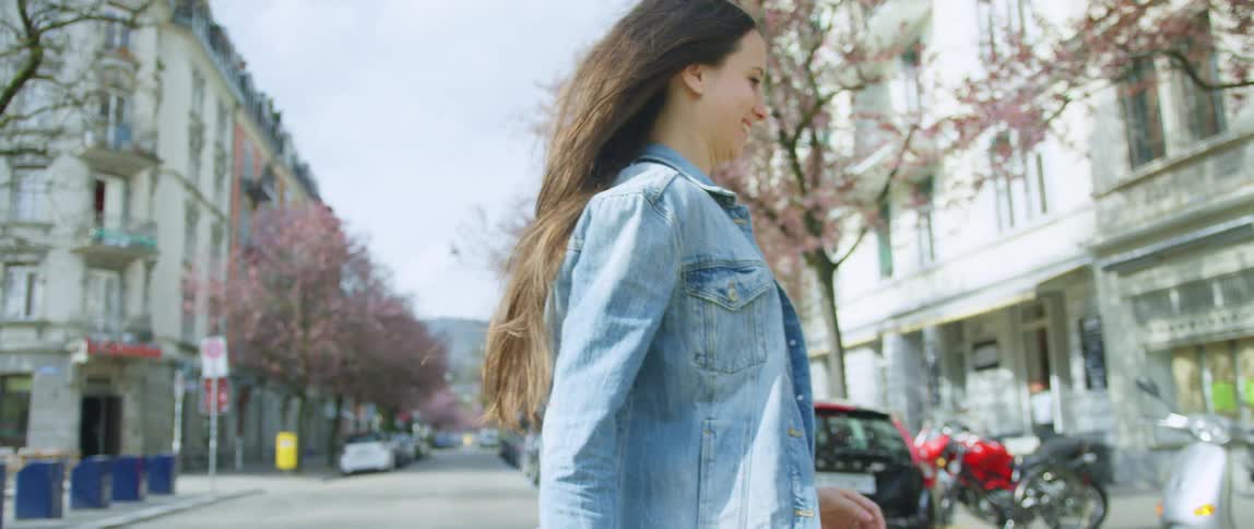 Woman runs across the street