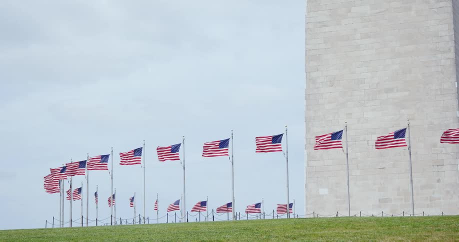 Flags in the breeze outside of a monument