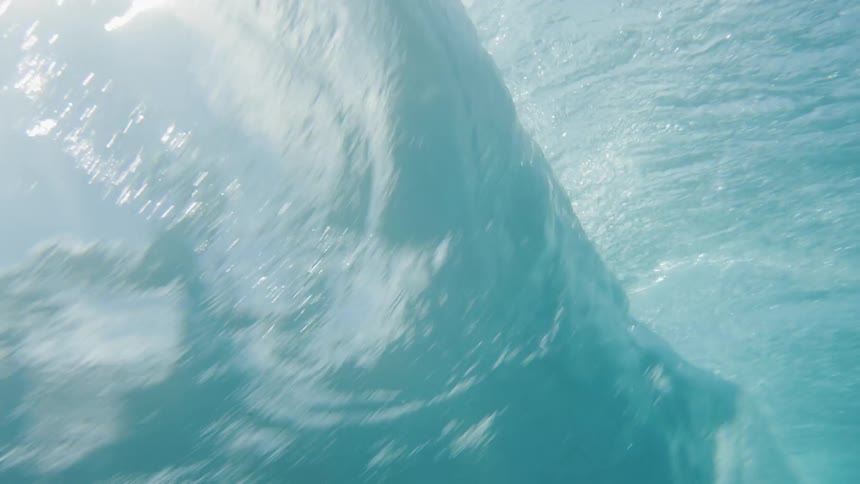 Underwater footage of an ocean wave