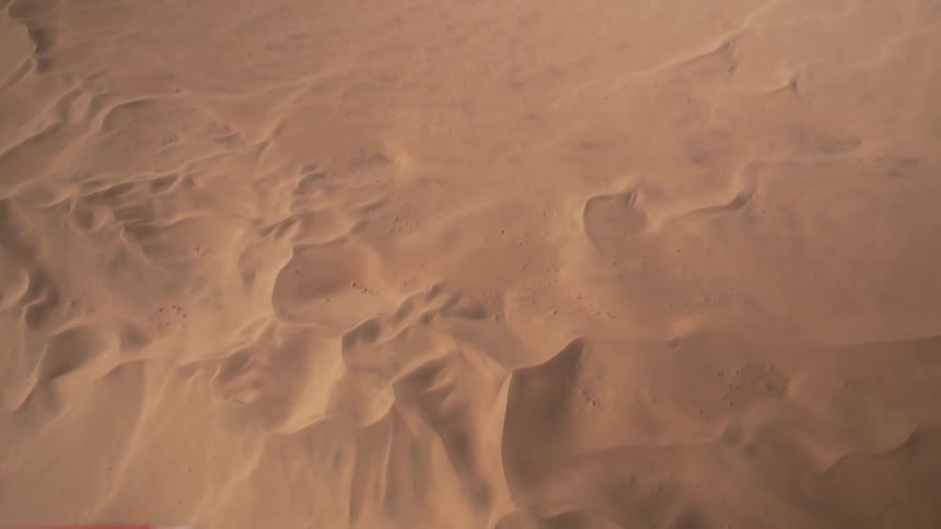 A desert with sandy dunes