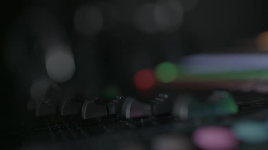 Close up of a control board with blinking lights