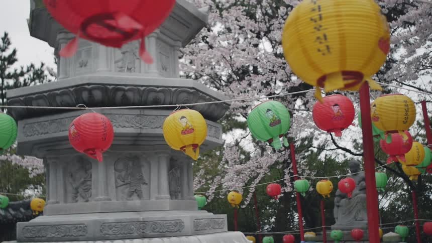 Paper lanterns sway in the breeze