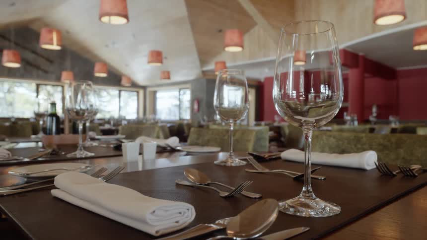Interior of dining room with set tables