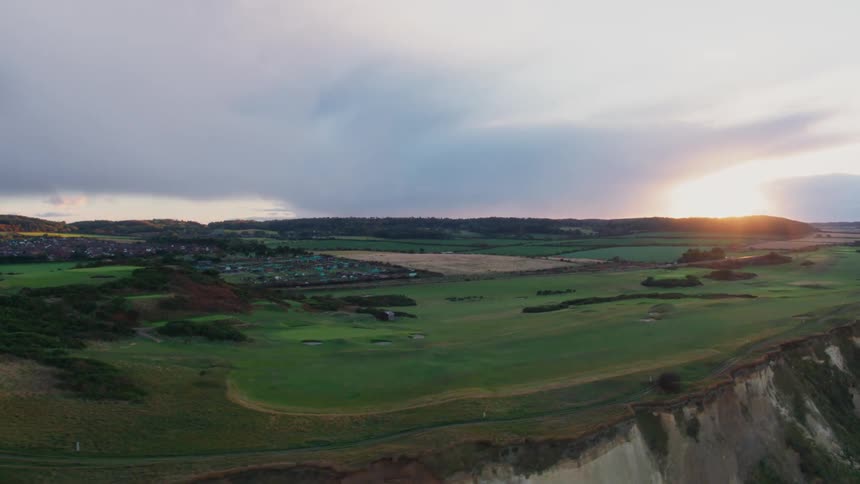 The sun is rising over the small town