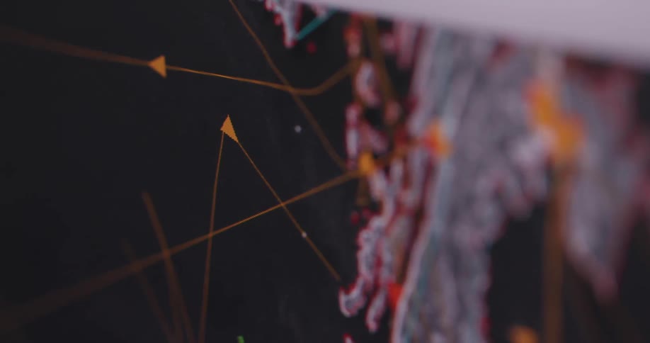 The monitor shows a map with arrows moving all over
