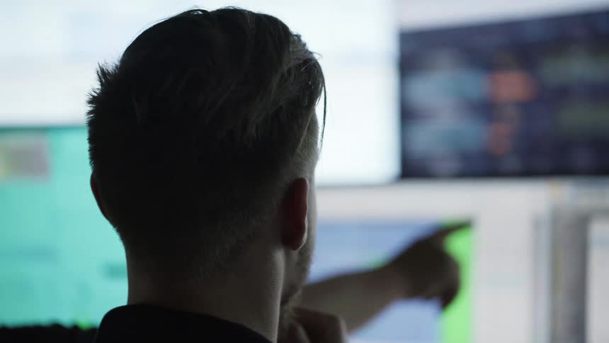 Coworkers work together in a computer lab