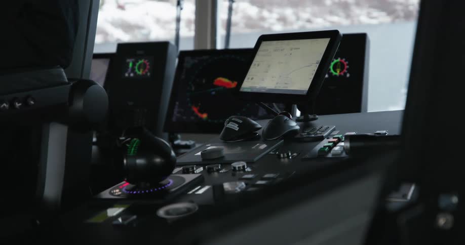 The control room is full of electronic devices