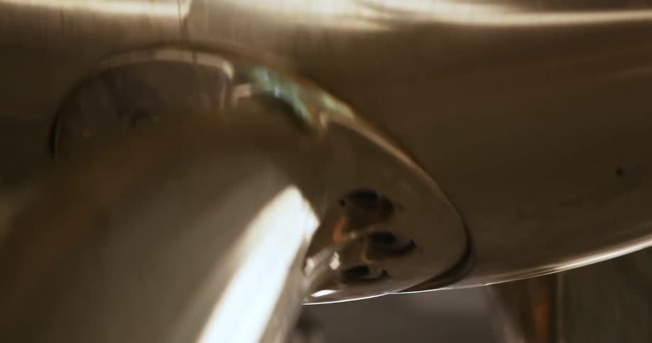 A machine spins inside a factory