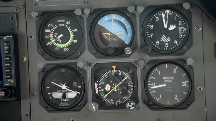 Several gauges in the dashboard of an airplane