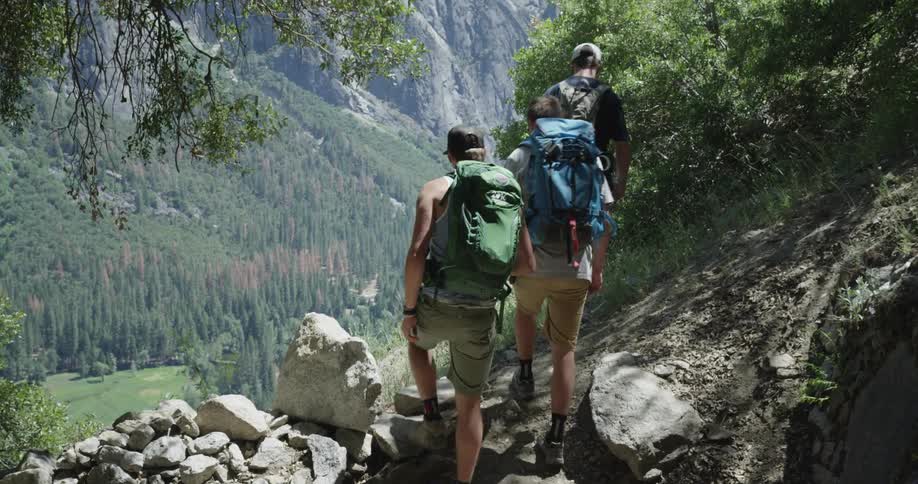 Three hikers stopping to look at the scenery