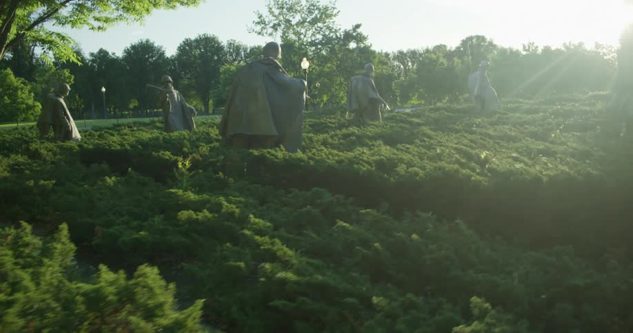 Statues of Korean War soldiers in a garden