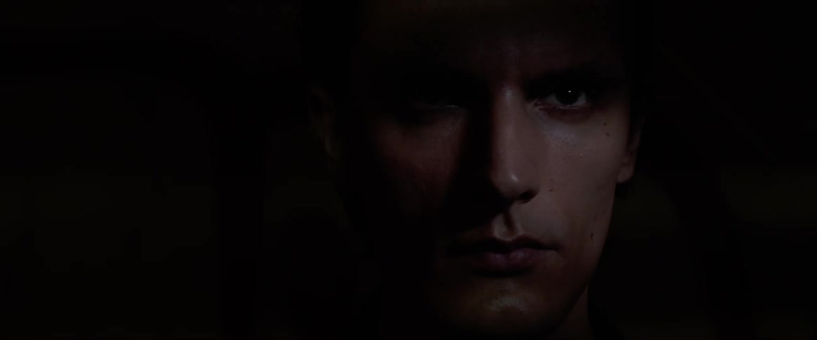 A man open his eyes as the room turns black and back on again