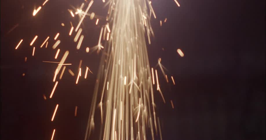 Sparks flying down from cutting metal