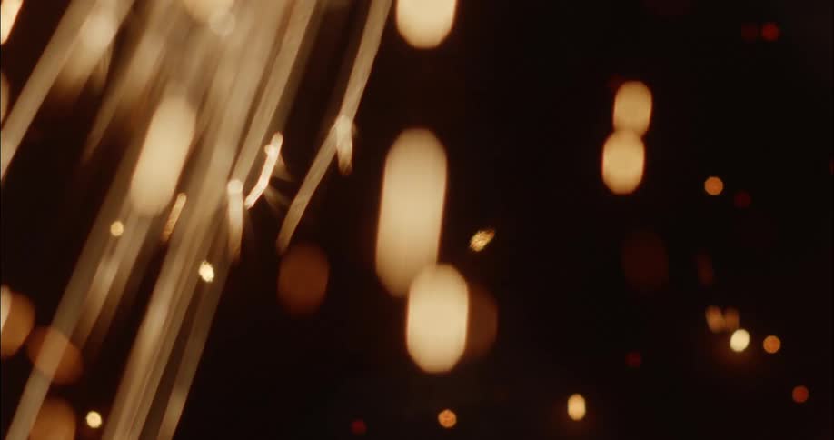 Yellow sparks fall from above