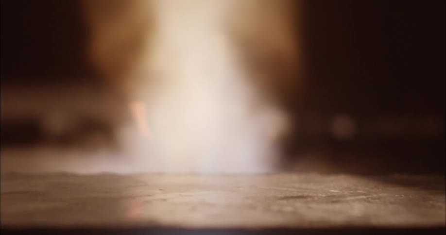 Fire moving across a piece of wood