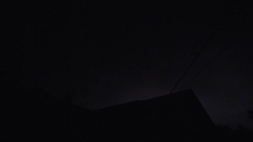 Lightning flashes in the sky during a nighttime storm