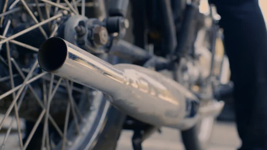 Close up of motorcycle exhaust outdoors