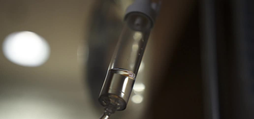 Liquid sits in an iv tube
