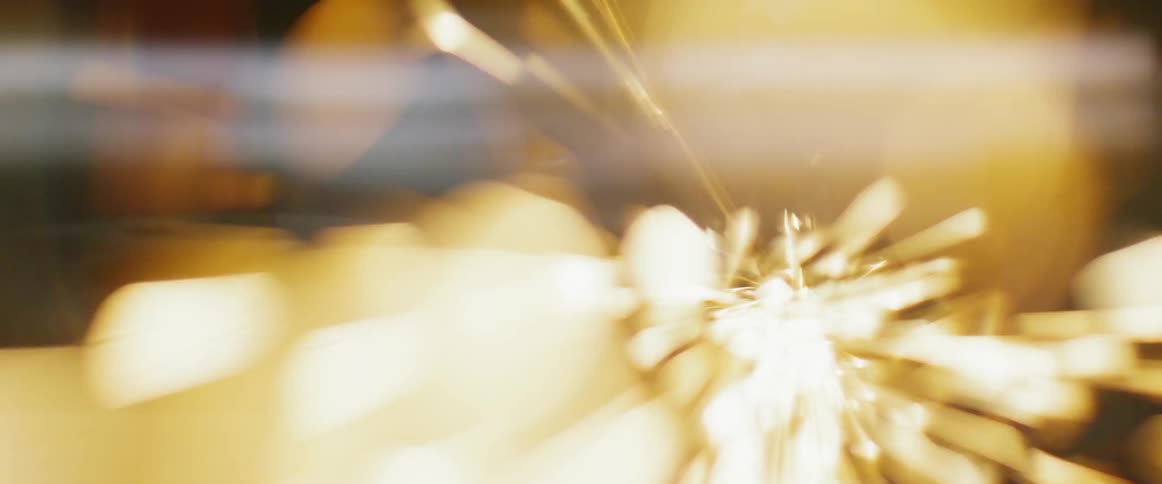 Sparks shoot outward