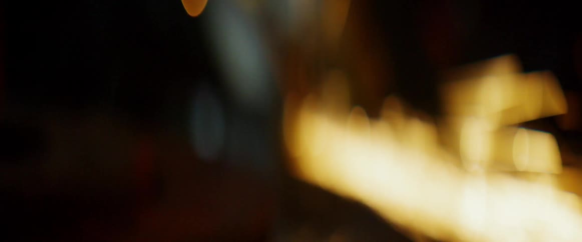 Sparks fly in a dark building