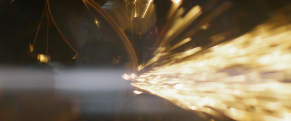Sparks fly from a grinder
