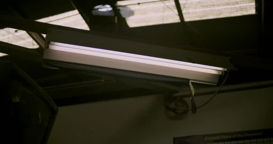 Overhead fluorescent light tube flickers on near old style monitor