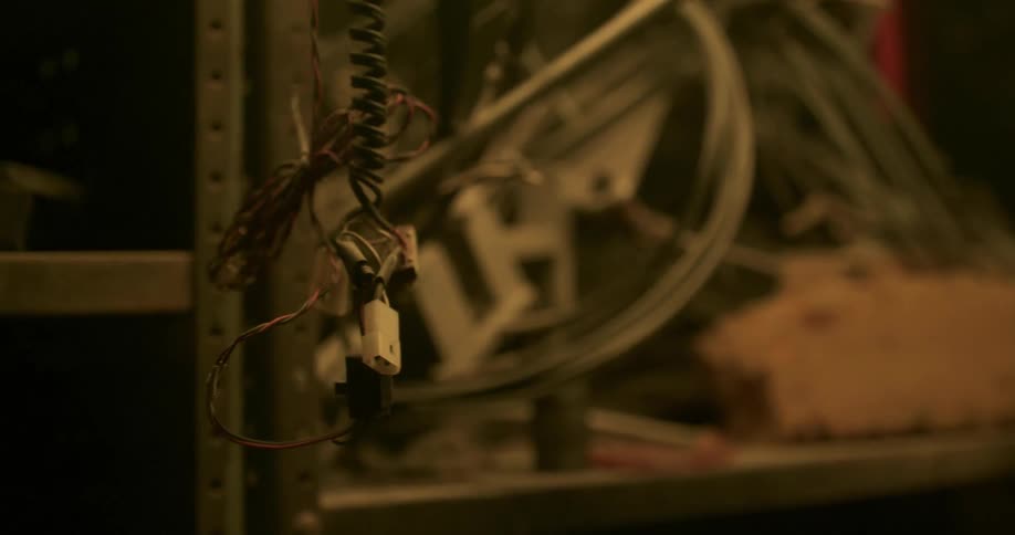 Wires and power supplies on a shelf