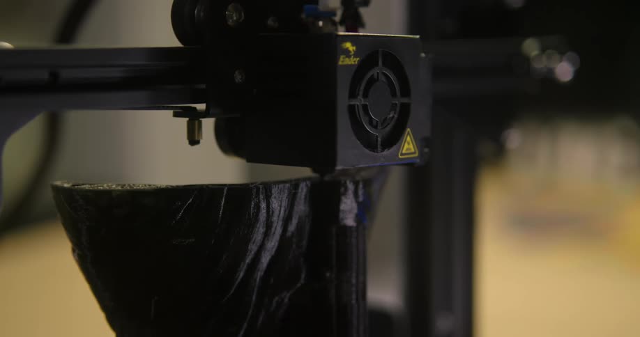 Electronic device slides down a groove in a metal arm