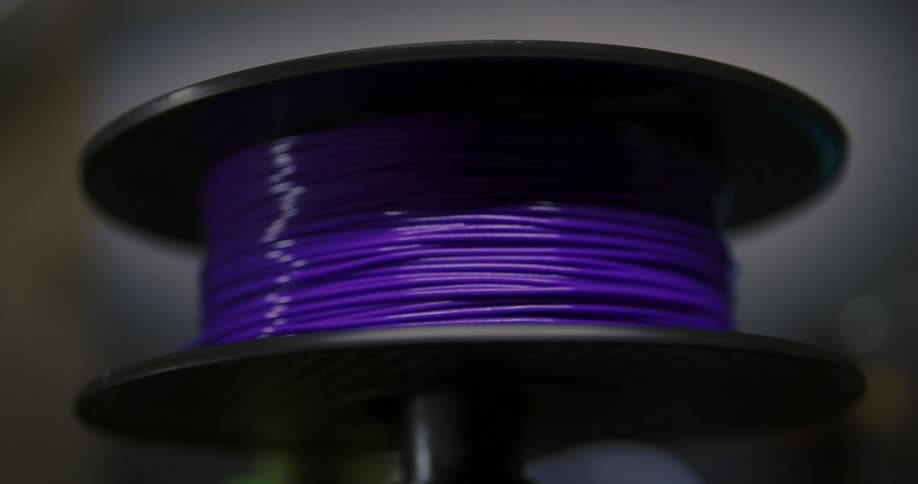 A large spool of purple wire